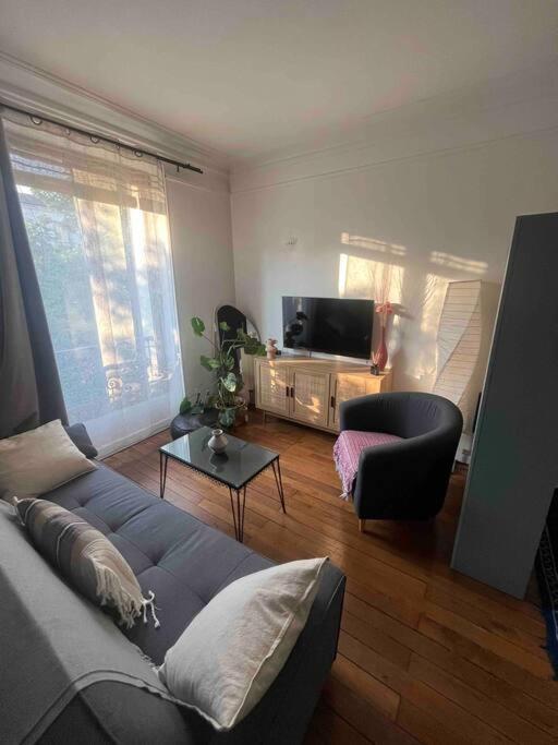 Charmant Appartement Proche Paris Сент-Уен Екстериор снимка