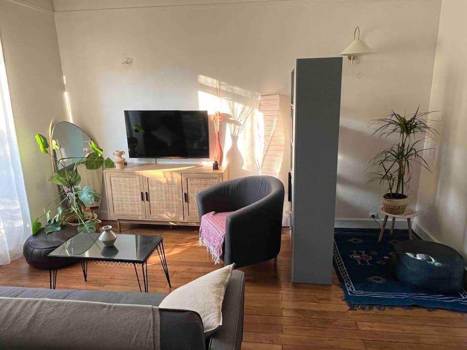 Charmant Appartement Proche Paris Сент-Уен Екстериор снимка